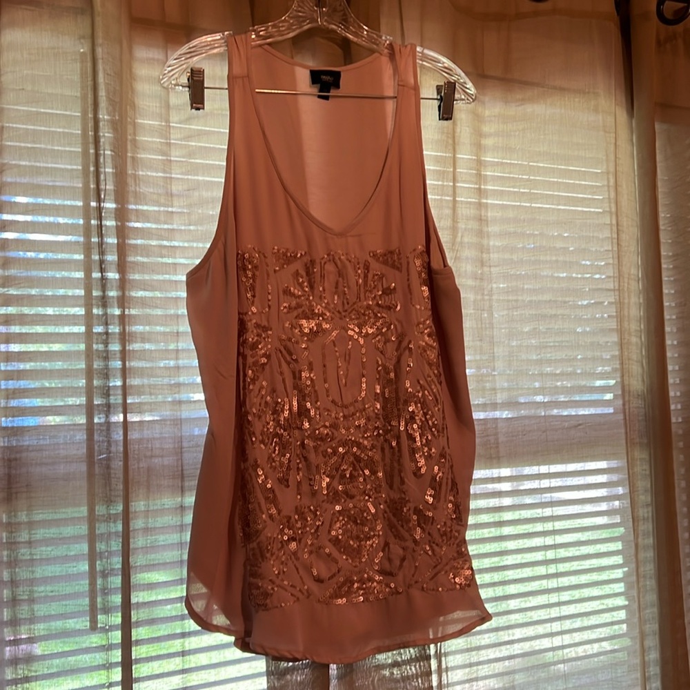 Cute summer tank top with sewn on sequins.